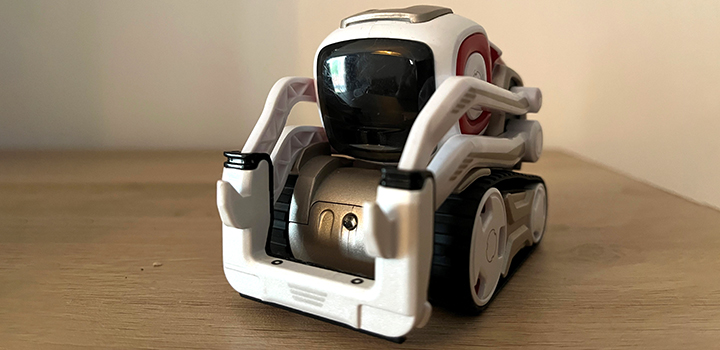 A photograph of the Cozmo robot on a table top