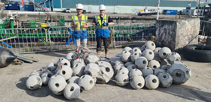 Exo team members with clusters of ExoHedrons, ExoHedrons and ExoSpheres ready for deployment