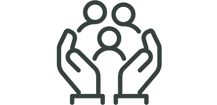 A drawing of a pair of hands holding three people up, two larger figures and a small one, looking like a family