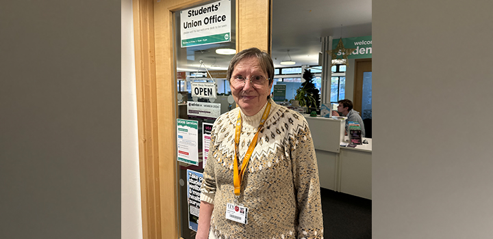 A woman smiling at the camera