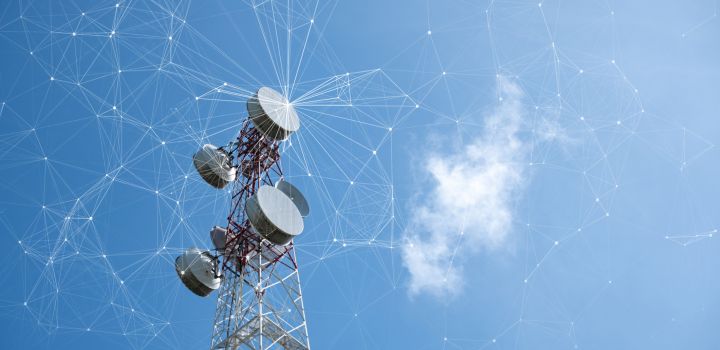 A telecommunication tower with mesh dots and glittering particles for wireless telecommunication technology.