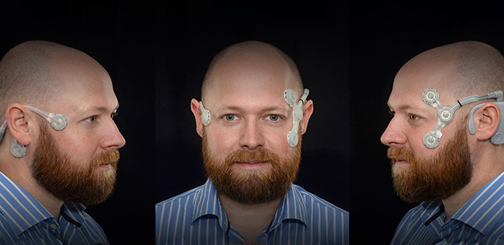 A man wears a headset device designed to help diagnose dizziness.