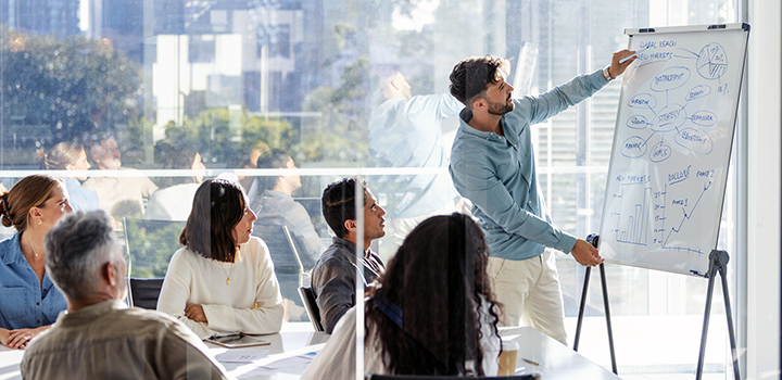 A group of people in a meeting.