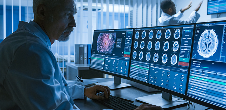 A doctor performs a brain scan.