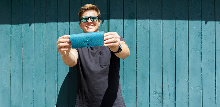 Jake Humphrey wearing sunglasses holding glasses case