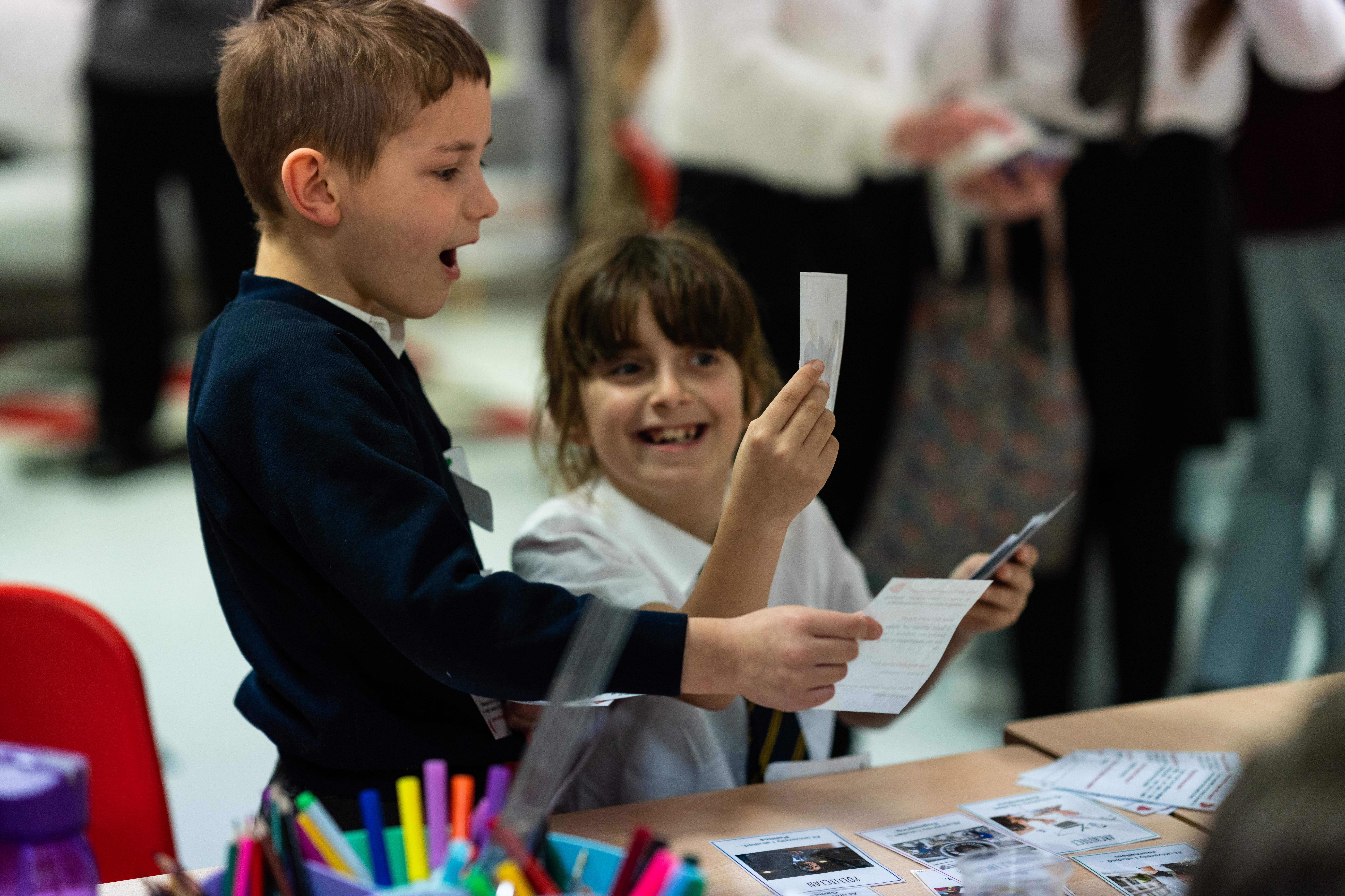 Two students smiling