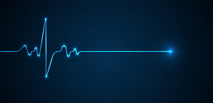 A graphic of a heartbeat on an ECG monitor.