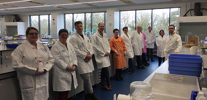 science staff in lab producing hand sanitiser