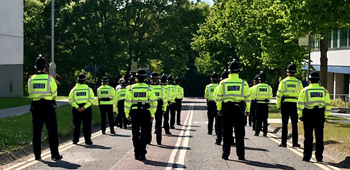 Trainee police officers line up on Chancellor's Drive